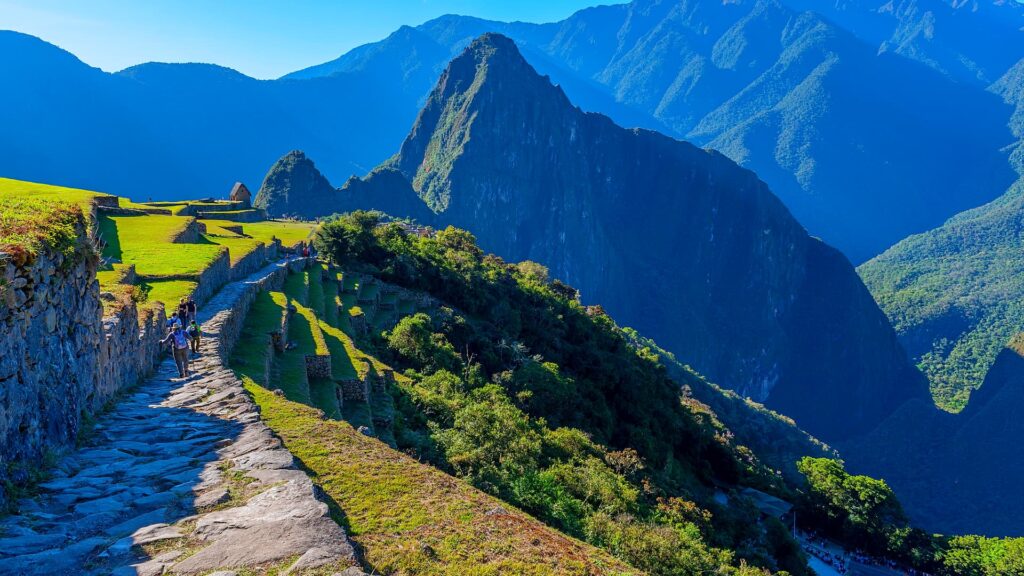 Machu Picchu with sweeping views of the Inca ruins and surrounding valleys.
