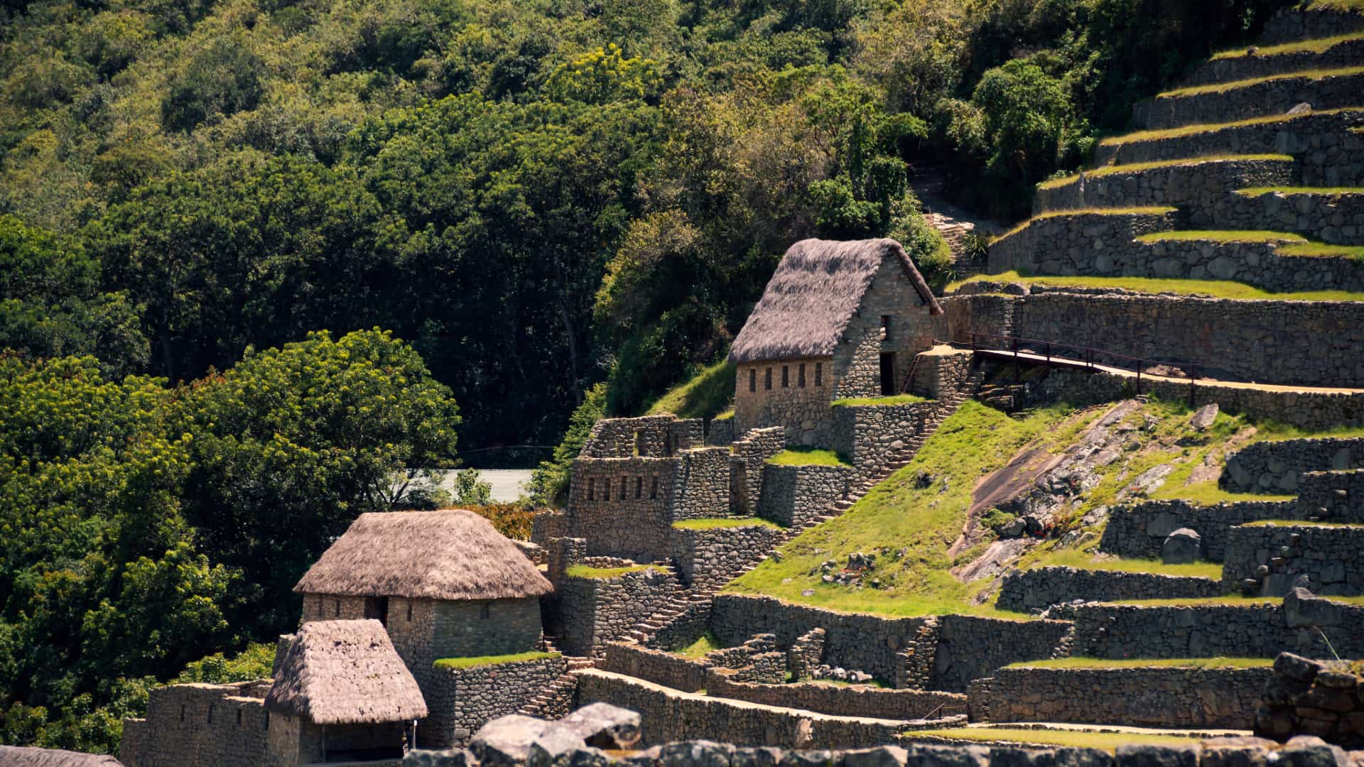 A group of hikers walking along a rugged mountain trail toward Choquequirao.