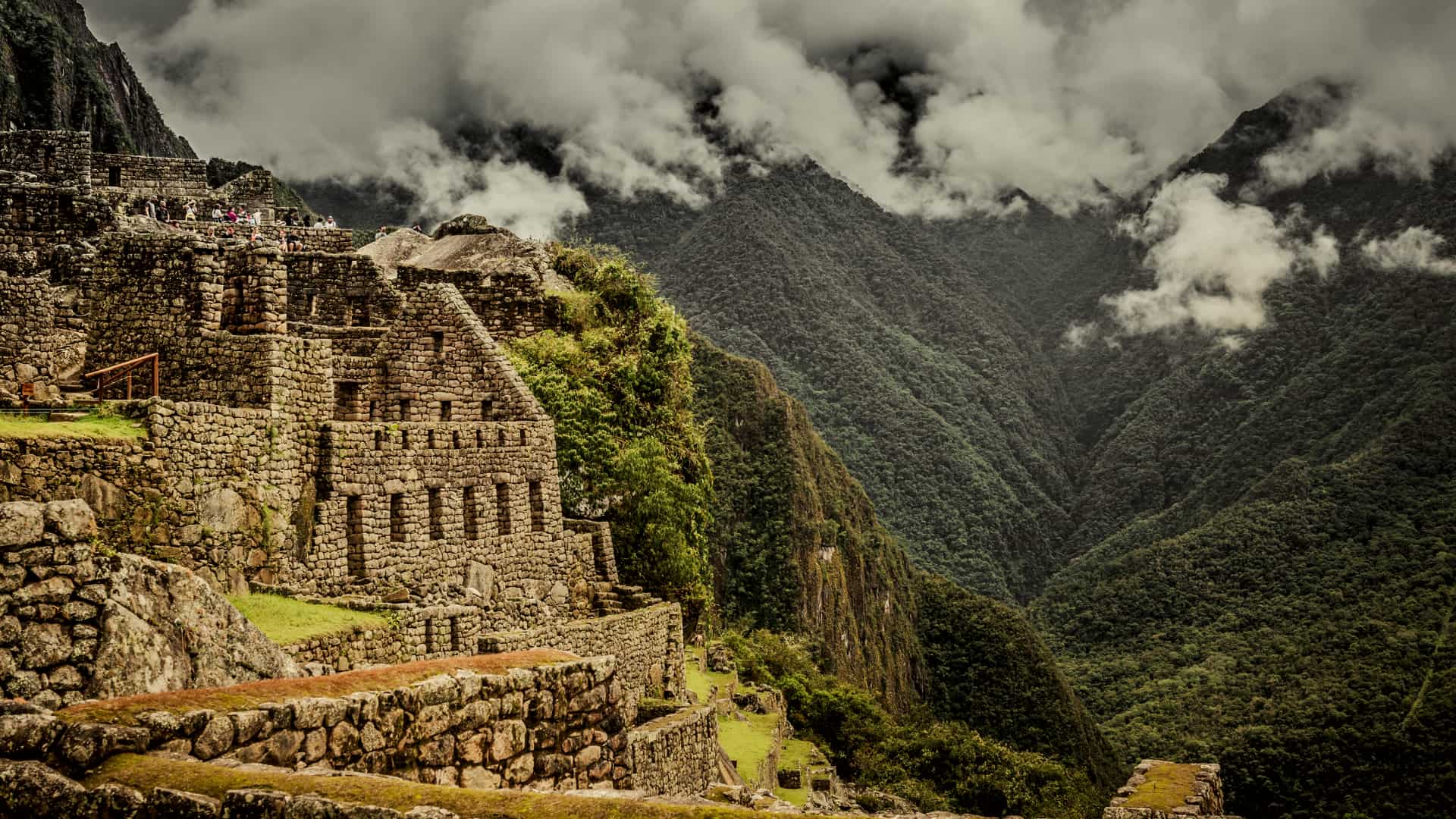An Andean priest performing a traditional ceremony under the stars in Cusco.