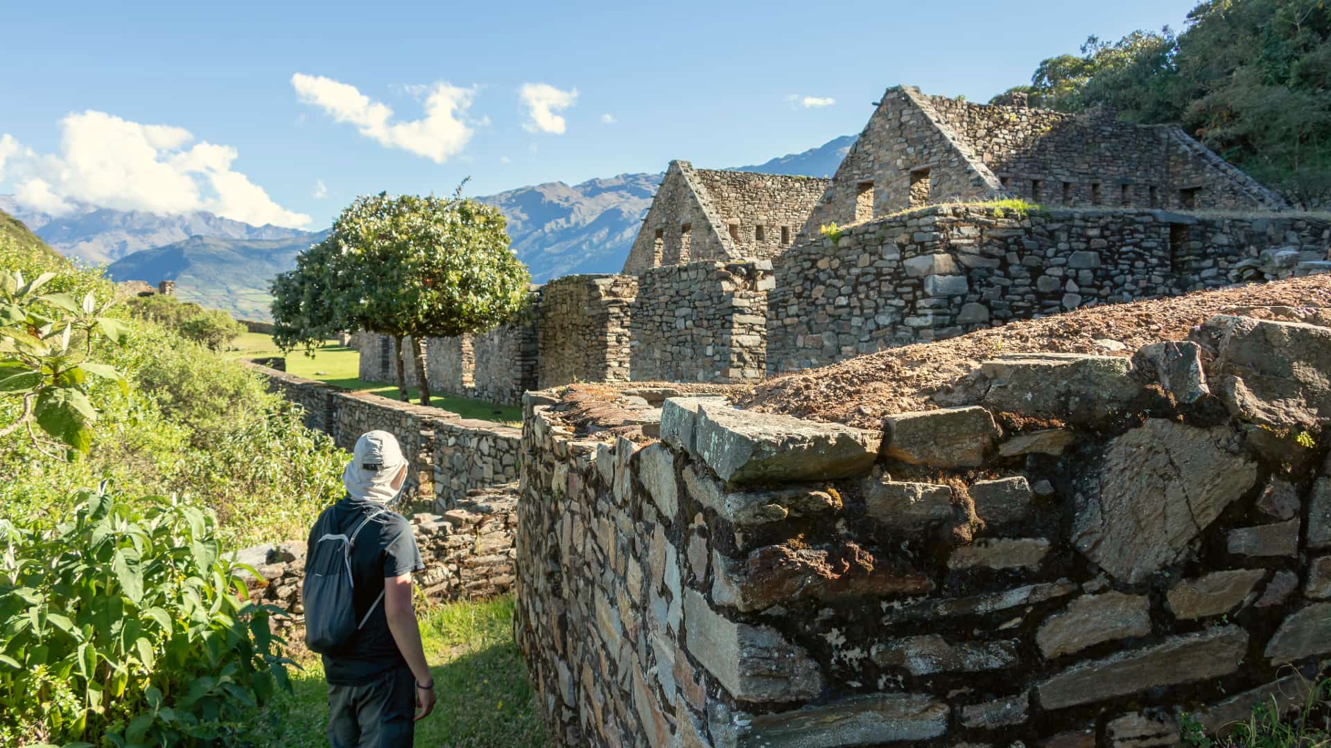 A group of hikers trekking through the scenic trails leading to Choquequirao.