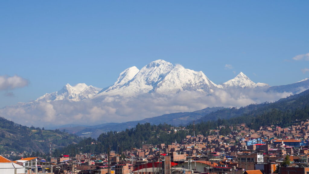 A serene view of high Andean mountains, illustrating the type of environment where it's crucial to know how to prevent altitude sickness - Authentic Incan Adventures